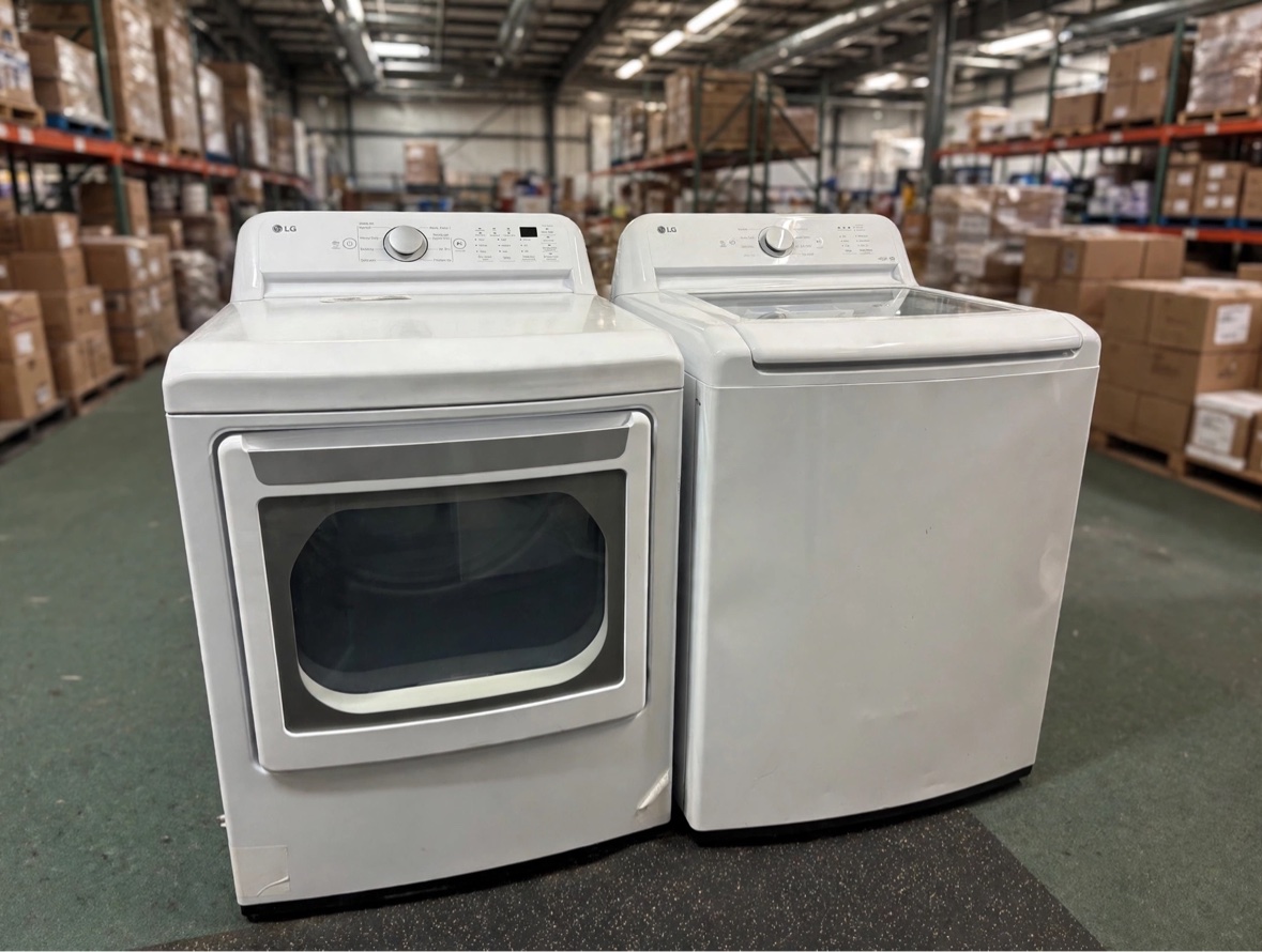 White LG ThinQ top-load washer and dryer set