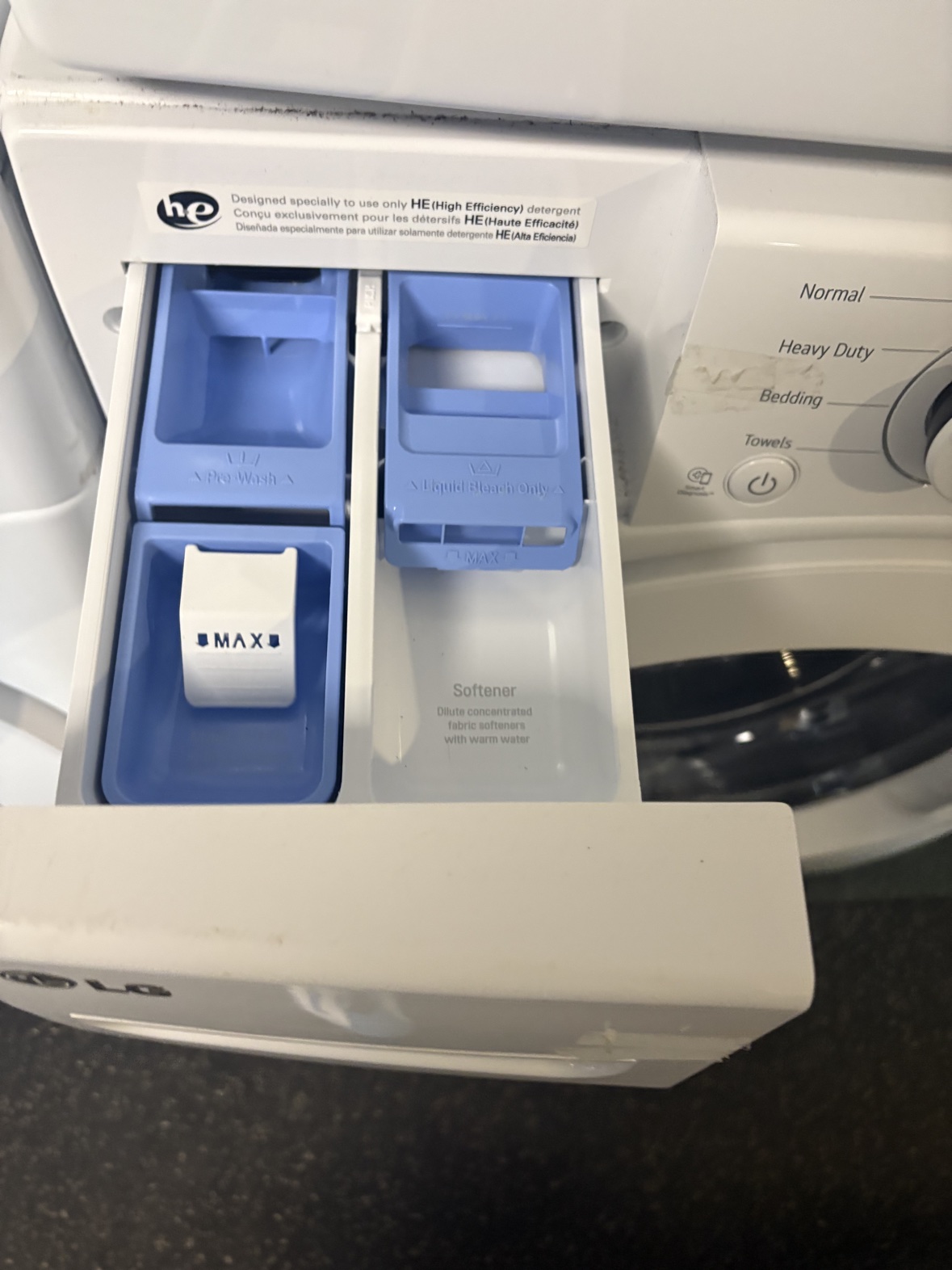 LG washer detergent drawer pulled open