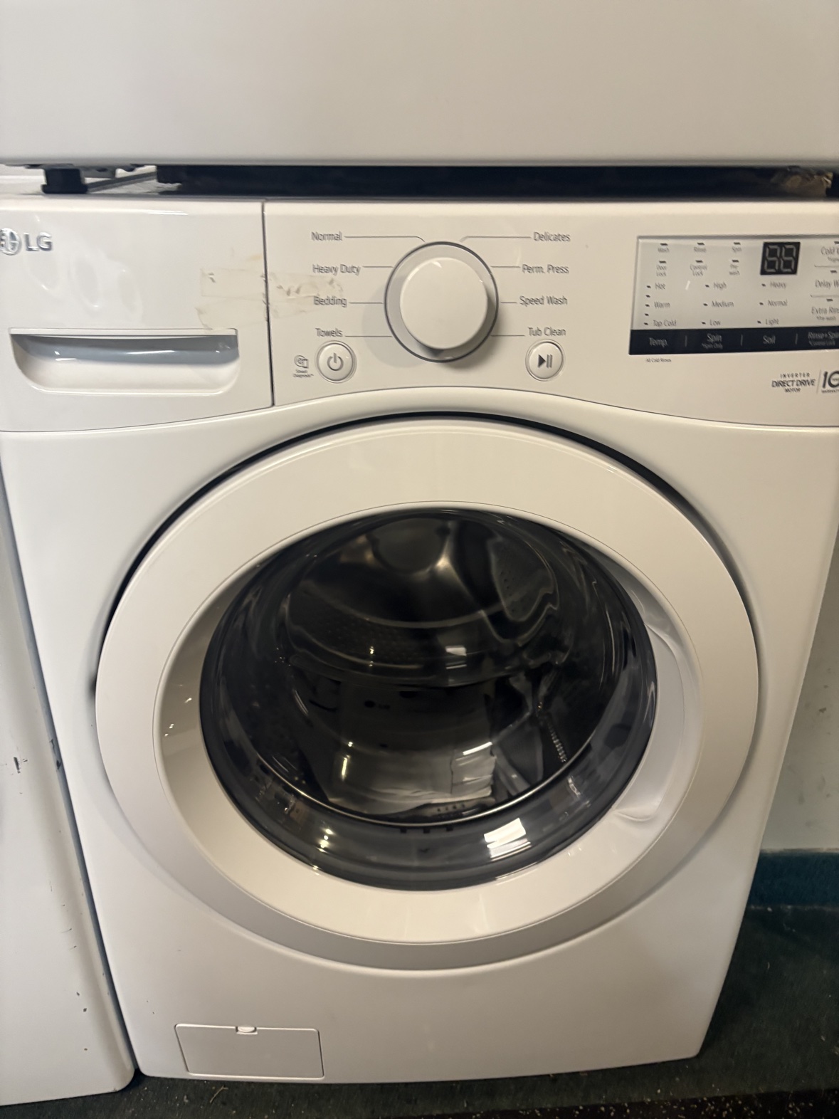 White LG front-load washer, front view