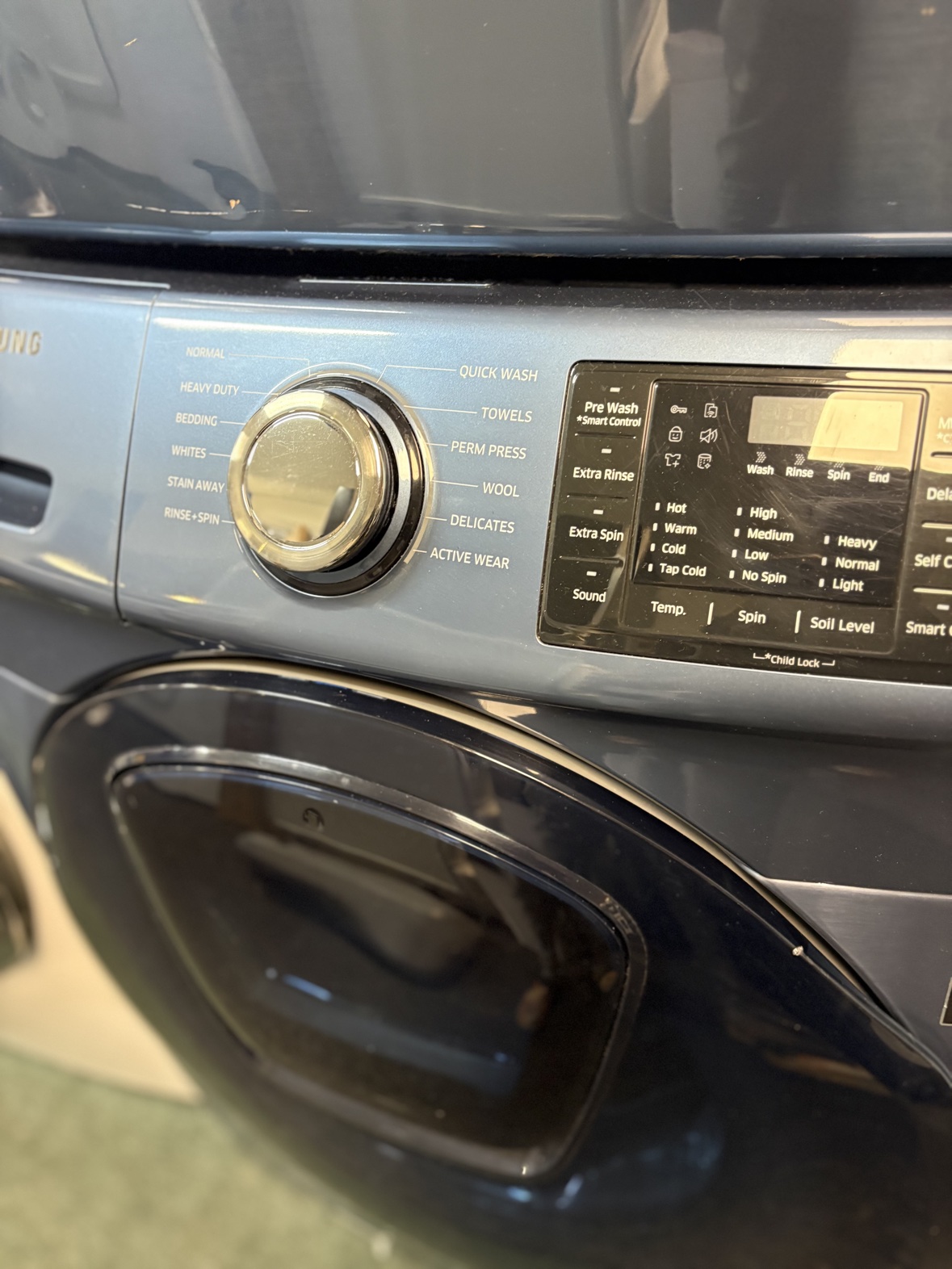 Samsung washer control panel with cycle dial and digital display