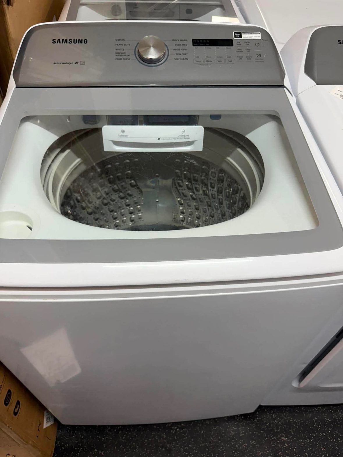 Samsung top-load washer with ActiveWaterJet, close-up