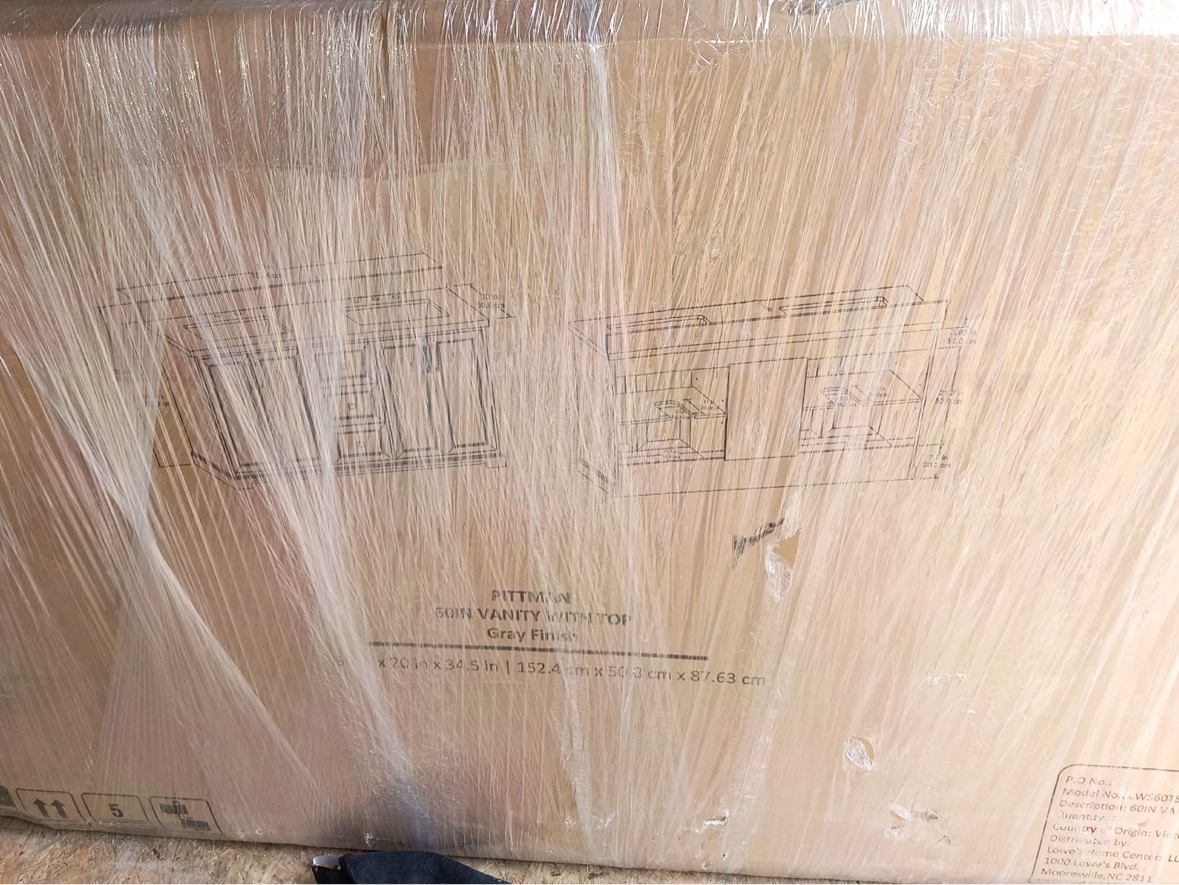 The sealed vanity box from a second angle, showing the Pittman 60 inch vanity diagram
