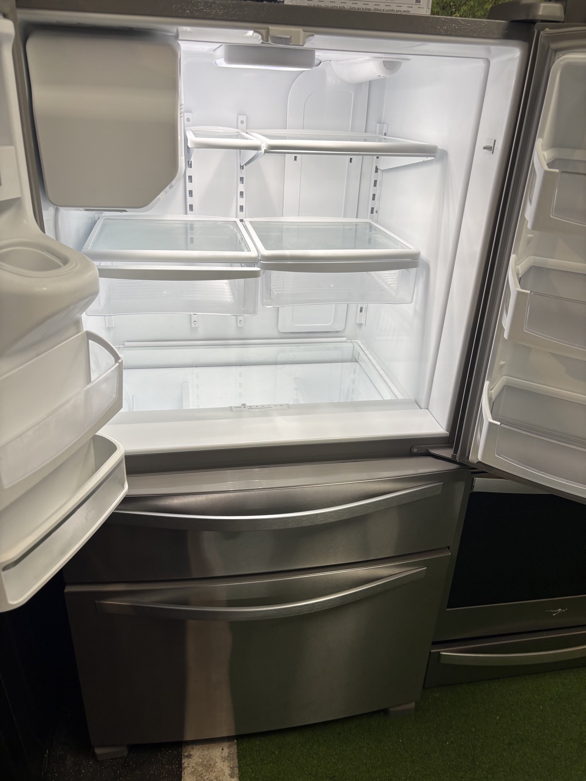 Inside the Whirlpool French-door refrigerator, showing the shelves and bins
