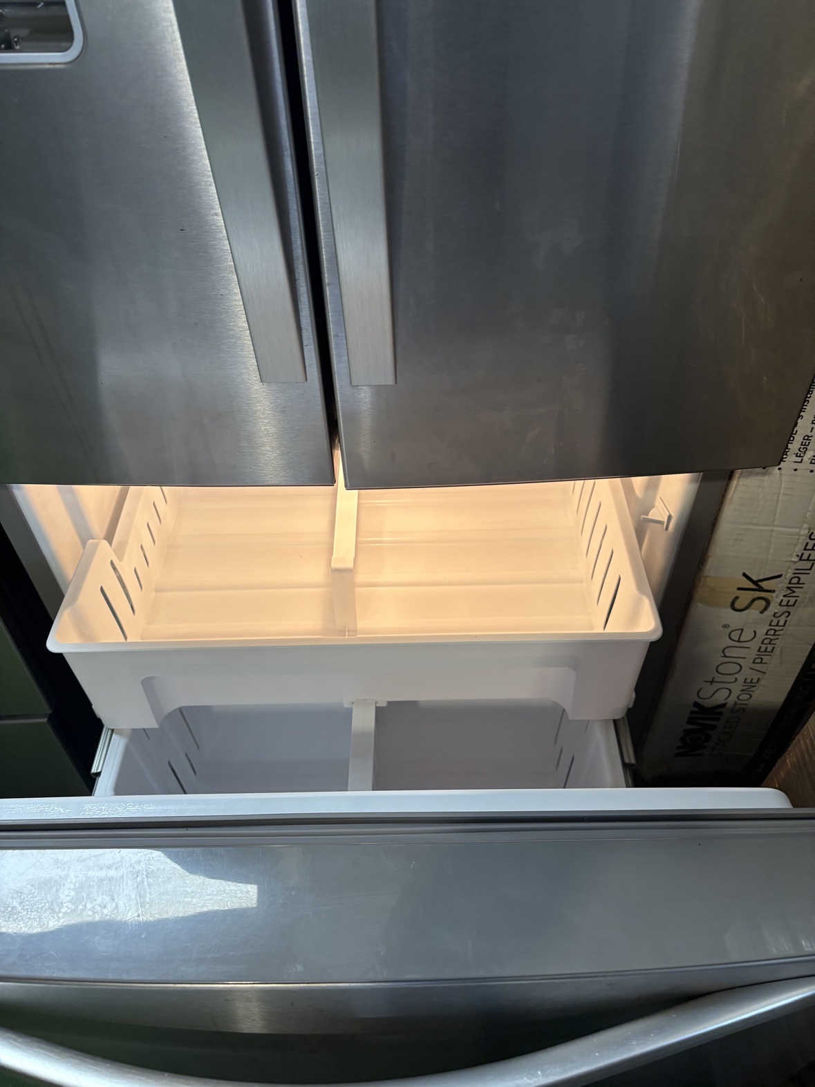 Whirlpool refrigerator freezer drawer, open